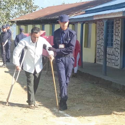 90-year-old Kumari Tamang casting her vote at Galchi Rural Municipality-5, Amantadev Secondary Polling Station Photo: Sitaram Adhikari Dhading